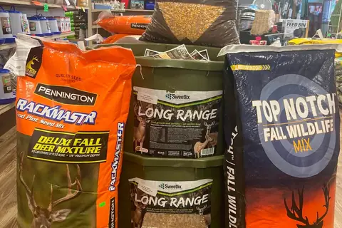 Bags of deer feed and fall wildlife seed mixes